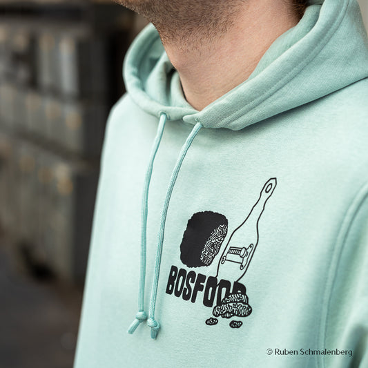 Close-up of the Truffel logo on the BOS FOOD Hoodie in sage color