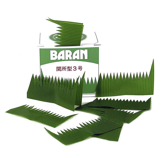 Sushi decoratie - Baran, gesneden groene bladeren, plastic, 1000 stuks - Alt text: Een grote hoeveelheid plastic gesneden groene bladeren, Baran sushi decoratie, 1000 stuks