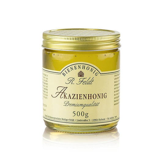 Acaciahoning uit Hongarije, met een lichtgouden kleur, vloeibare textuur en een delicaat zoete smaak, perfect om gerechten te zoeten, in een verpakking van 500 g