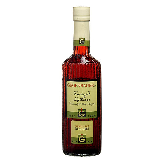 Wijnazijn Zweigelt Spätlese, een fruitige en lichtzure rode wijnazijn met 6% zuurgraad, verpakt in een fles van 250 ml
