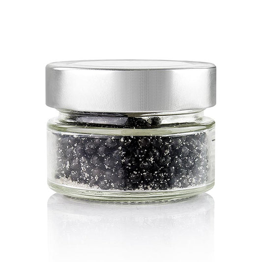 A close-up image of Gewürzgarten Zwarte Peper De Luxe, showing the whole, fermented peppercorns with sea salt in a 80 g package