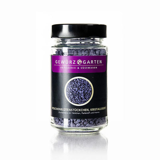A close-up image of Gewürzgarten viooltjesbloesem stukjes, gekristalliseerd, 140 g product packaging with vibrant purple and green colors, showcasing the crystallized violet blossom pieces inside the 140 g container