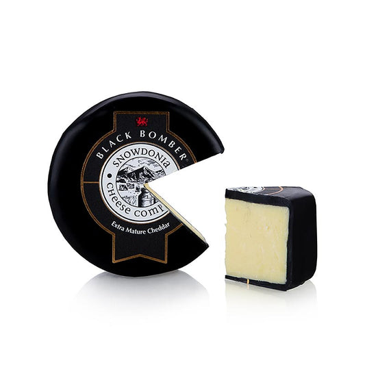Snowdonia - Little Black Bomber, gerijpte cheddarkaas, zwarte was, 200 g - Een afbeelding van een 200g verpakking van de gerijpte cheddarkaas genaamd Little Black Bomber uit Snowdonia, omhuld in zwarte was
