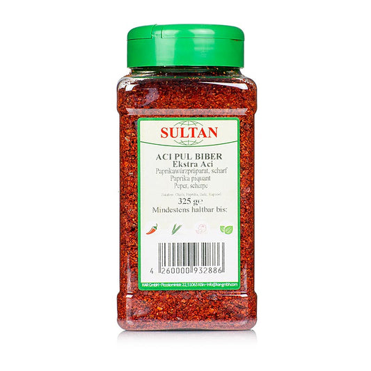 A 325 g container of Pul Biber, Turkse chilikruiden, a flavorful Turkish chili spice blend