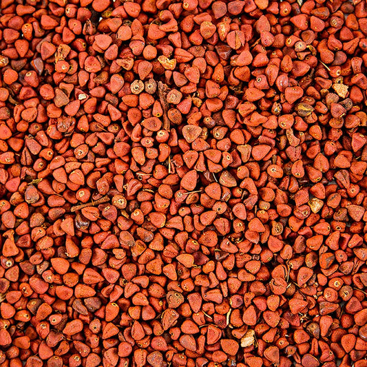 100 grams of annatto seeds, also known as the orlean shrub seeds, in a package