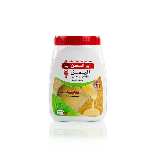 A 454 g jar of Al Yaman tahini sesame paste, a rich and creamy Middle Eastern condiment made from ground sesame seeds