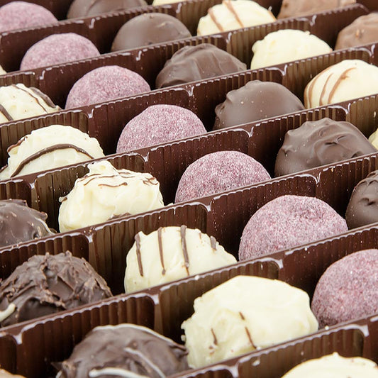 Assortment of 7 types of Dreimeister truffle pralines, 1 kg, approximately 77 pieces