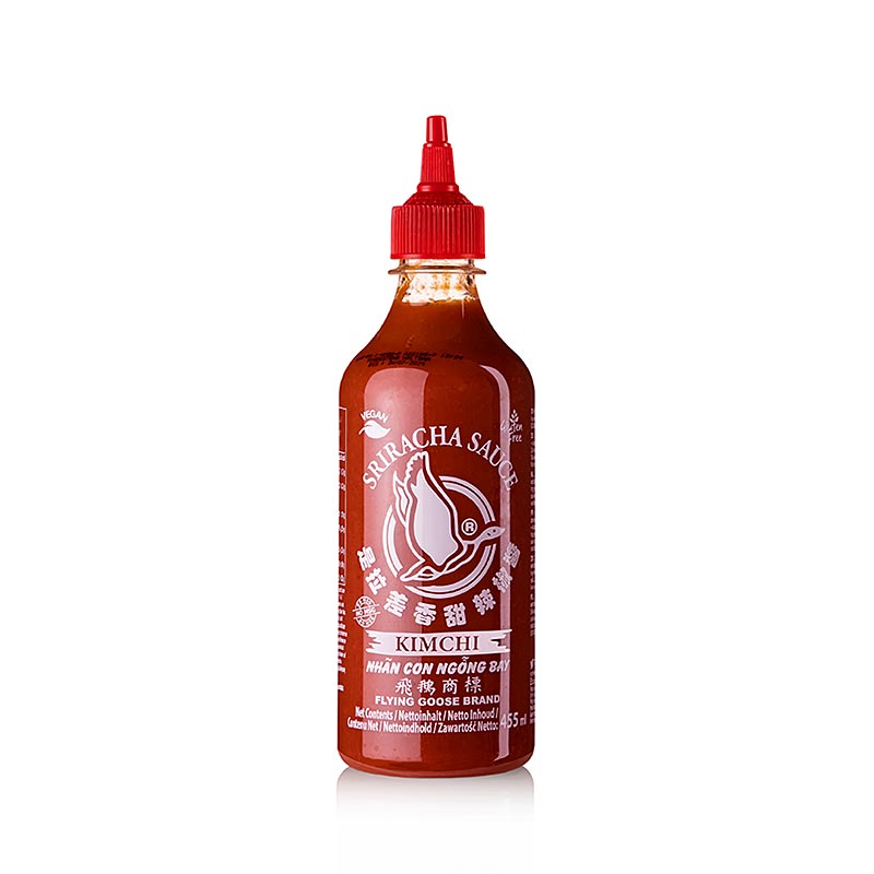 A 455 ml bottle of Flying Goose Sriracha hot sauce with KimChi, a spicy and flavorful condiment for adding heat and depth to dishes