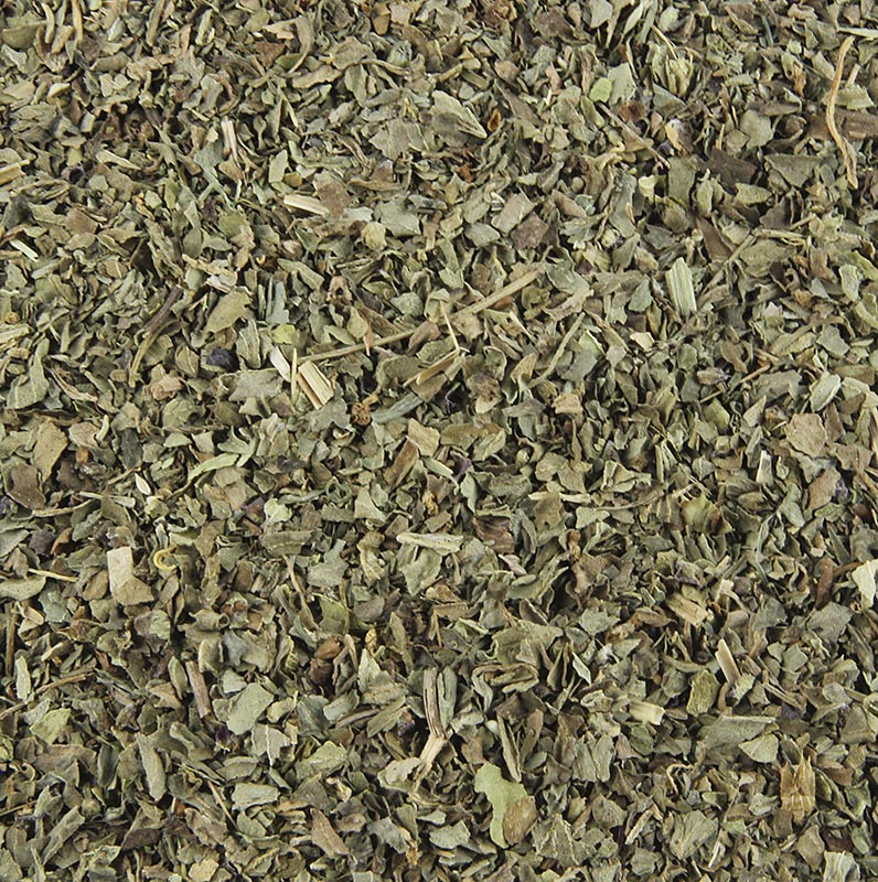 Photo de 1 kg de basilic séché et frotté, emballé dans un sac