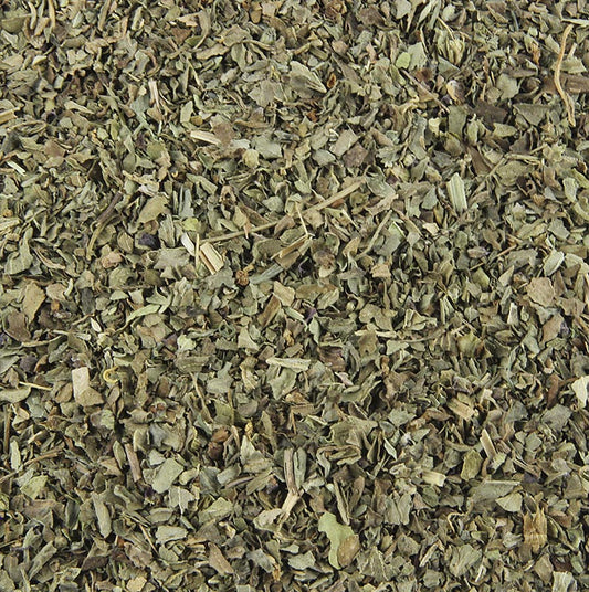 Photo de 1 kg de basilic séché et frotté, emballé dans un sac