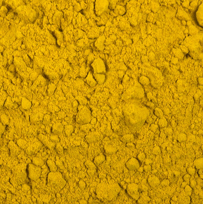 1 kg de curcuma moulu emballé dans un récipient pratique