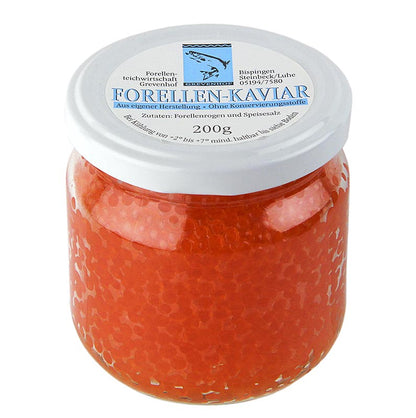 Gros plan sur le caviar de truite de qualité supérieure de 200 g dans une luxueuse couleur or-orange