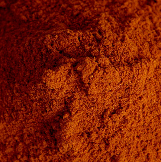 Paprika - doux, 1 kg - Un kilogramme de paprika doux emballé dans un sac