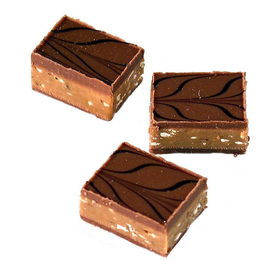 Chocolats Valrhona Rinette Lait, nougat et amandes croustillantes au lait entier, 2 kg - Image de délicieux chocolats Valrhona au nougat et amandes croustillantes au lait entier paquet de 2 kg