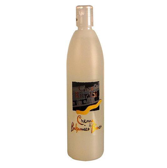 Bouteille en verre contenant 500 ml de Crema di Balsamico Bianco de Casa Rinaldi, à utiliser dans les desserts et autres plats.