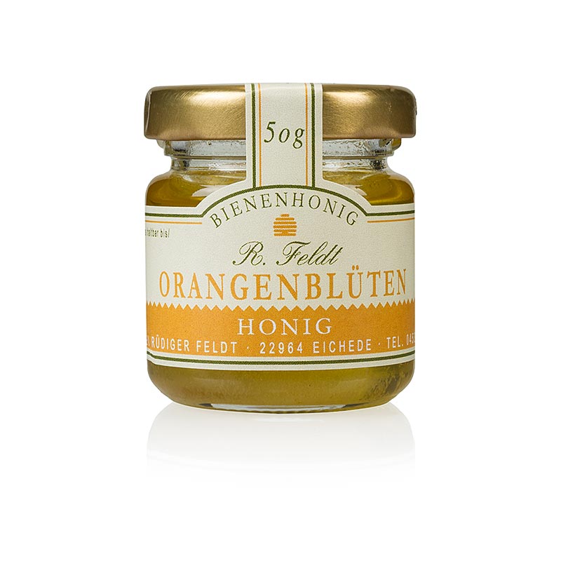 Alt text : Miel doré liquide de fleurs d'oranger d'Espagne dans un pot de 50 g.