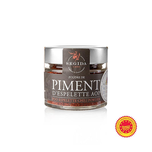 Le piment d'Espelette, également appelé piment français, est une poudre de piment de haute qualité provenant de la région basque de la France, certifiée avec le label AOP, dans un emballage de 40 grammes.