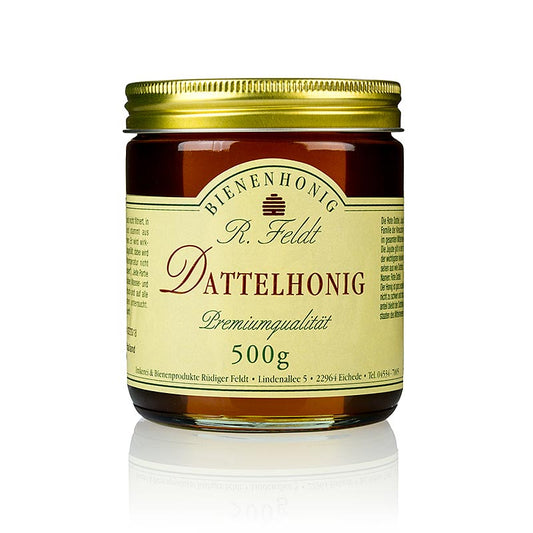 Miel de dattes, un miel foncé et liquide de Thaïlande, à la saveur harmonieuse, disponible en paquets de 500 grammes.