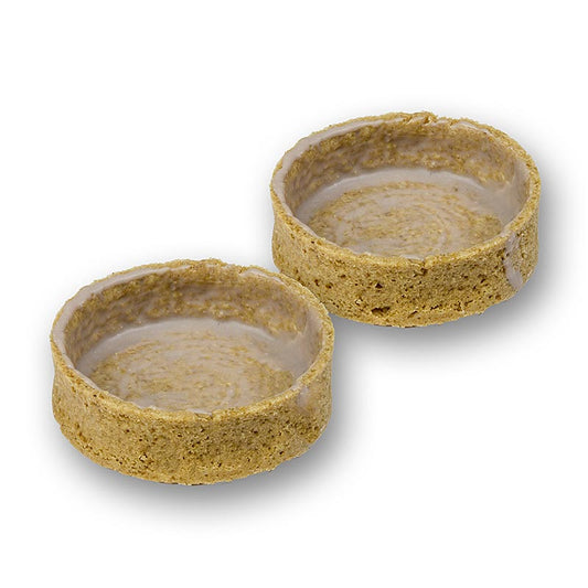 Délicieuses tartelettes de dessert au graham cracker, enrobées et mesurant 55x17mm de diamètre et de hauteur, 1 kg de poids, et présentées dans un paquet de 100 pièces.