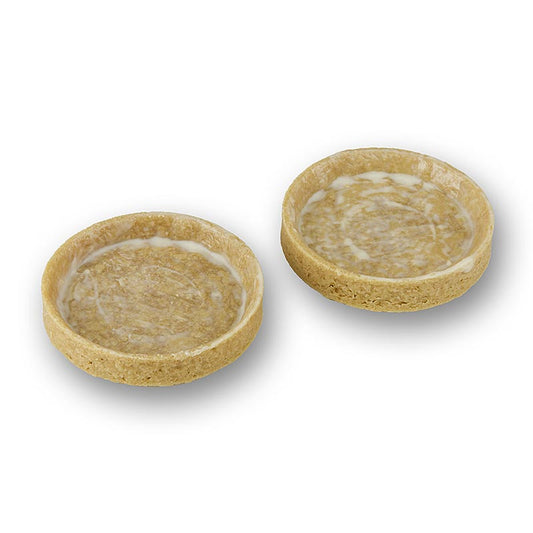 Tartelettes de dessert au beurre AOP, enrobées, d'un diamètre de 55mm et d'une hauteur de 10mm, d'un poids de 800g, et présentées en paquet de 100 pièces