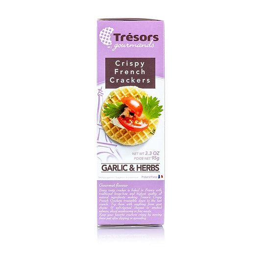 Gros plan sur Barsnack Tresors - Crispy franz Mini waffle crackers à l'ail et aux herbes, 95 g montrant la texture croustillante et l'assaisonnement savoureux