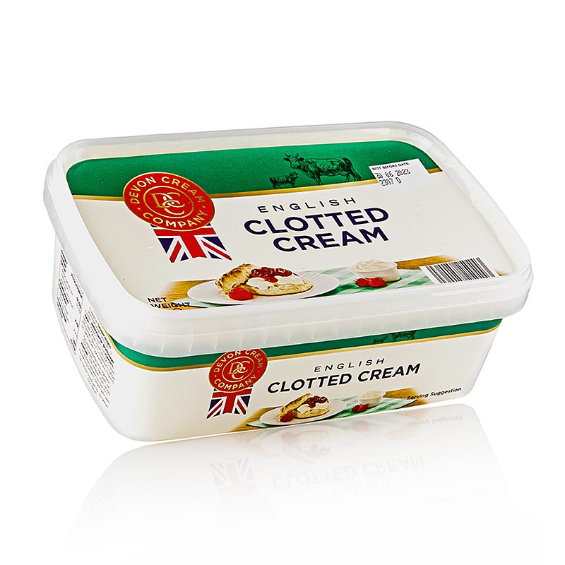 Un récipient de 1 kg de clotted cream anglaise, un produit laitier épais et crémeux contenant 55 % de matières grasses.
