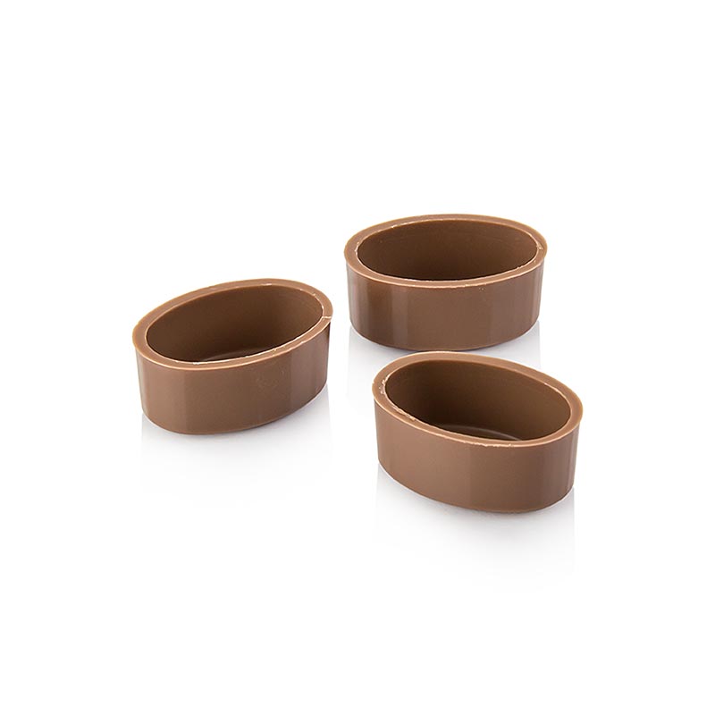 Grandes coquilles ovales de 32/33 mm x 22/24 mm, 13 mm de haut, fabriquées avec du lait riche et entier, de Läderach, pesant 2,352 kg, avec un total de 784 pièces.