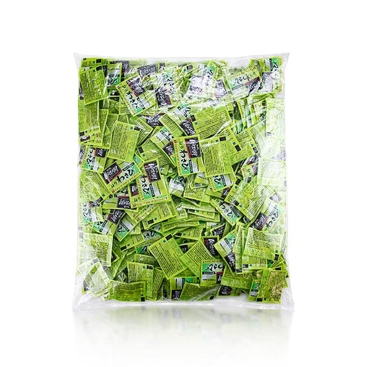 Pâte de wasabi biologique à base de raifort vert, conditionnée dans un sac de 125 kg contenant 500 portions individuelles de 25 g.