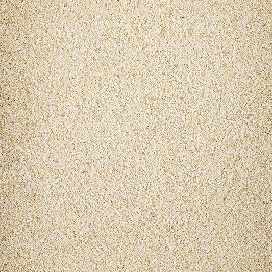 Gros plan sur un emballage de 1 kg de granulés d'oignon de 05 mm, un produit de haute qualité pour des applications polyvalentes.