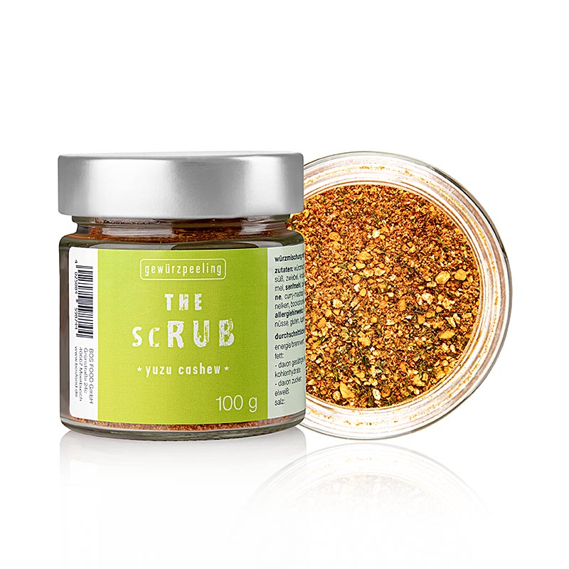  Une main tenant un sachet de Serious Taste the bush - Yuzu Cashew, avec le produit bien en évidence, Ernst Petry, 100 g