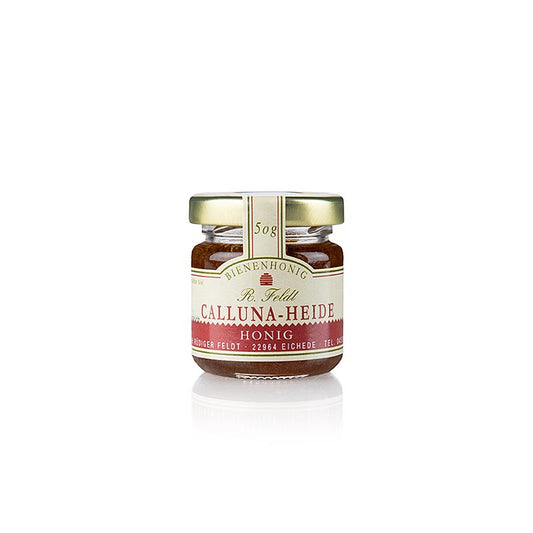 Miel de bruyère calluna, pot de 50 g provenant du rucher Feldt, mettant en valeur le produit naturel qu'est le miel dans un emballage magnifique et rustique.
