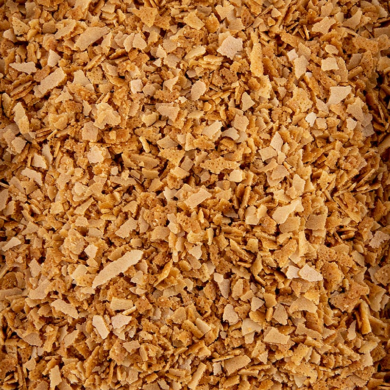 Un paquet de 25 kg de Valrhona Eclat d'Or, crêpes émiettées comme garniture croustillante (14592) produit avec des crêpes émiettées comme garniture croustillante.