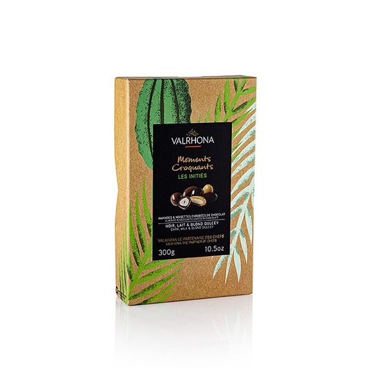 Valrhona Equinoxe, amandes et noisettes en chocolat amer, lait et Dulcey, 33898, 300 g - Image du produit montrant les différentes saveurs et ingrédients
